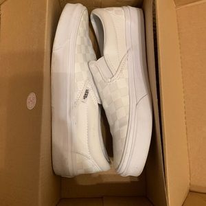 all white checkered vans